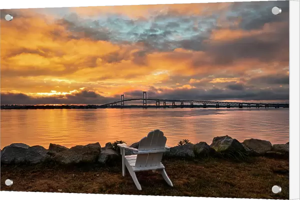 Rhode Island, Newport, adirondack chair facing Claiborne Pell Bridge over Narragansett Bay