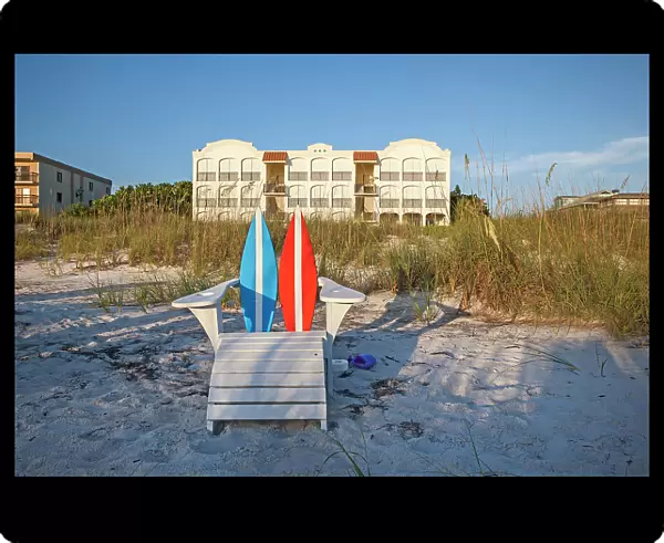 Florida, Saint Petersburg Beach, adirondack chair in front of beachfront home