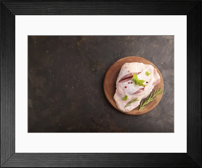Framed Print : Raw Turkey Thigh Print with Herbs on Black Concrete Framed Print : Raw Turkey Thigh Print with Herbs on Black Concrete