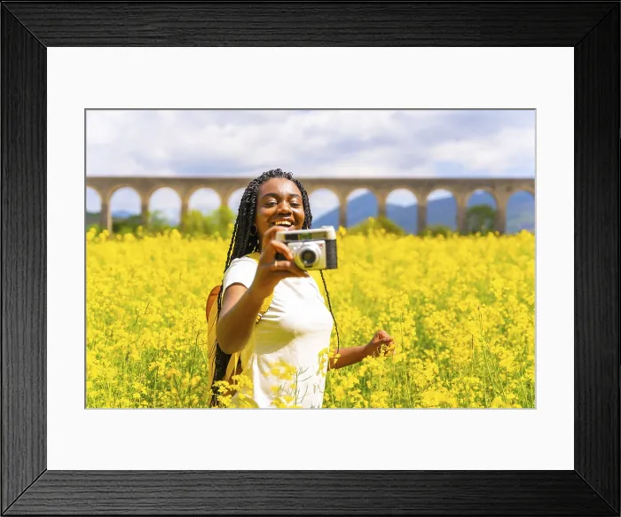 Framed Print : Vintage Camera Print: Smiling Traveler in Yellow Field