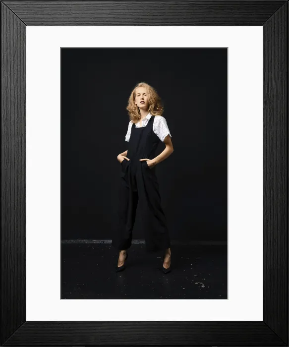 Framed Print : Young Fashion Model in Black Pantsuit Print Framed Print : Young Fashion Model in Black Pantsuit Print