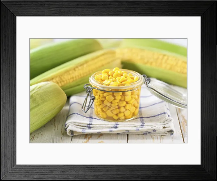 Framed Print : Canned Sweet Corn Print on White Table Framed Print : Canned Sweet Corn Print on White Table