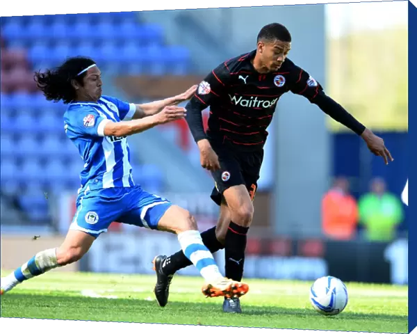 Reading FC's Championship Battle: Wigan Athletic vs. Reading (2013-14)