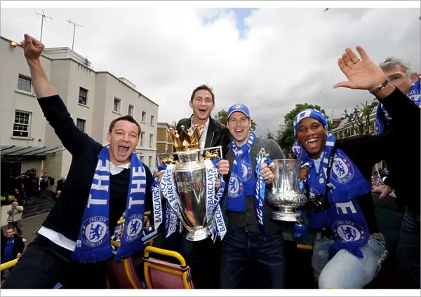 Chelsea Champions 2010: Terry, Lampard, Cech, and Drogba with Premier League and FA Cup Trophies
