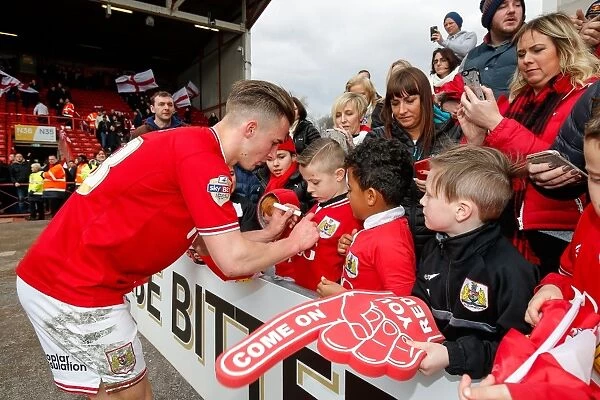 Joe Bryan of Bristol City Greets Young Fans After Championship Match Against Cardiff City