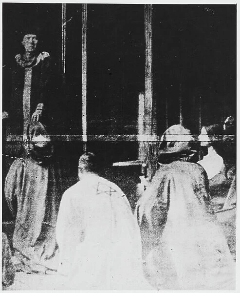 Aleister Crowley performing rites at his temple, with followers knelt before him