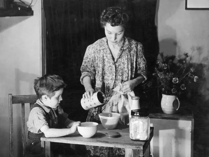 Framed Print : 1940s Kitchen Scene Print: Mother and Son Baking Tea-Bread Framed Print : 1940s Kitchen Scene Print: Mother and Son Baking Tea-Bread