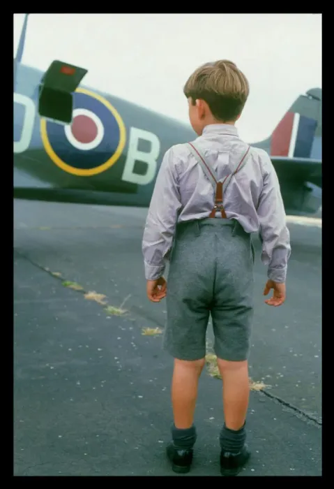 Framed Print : Spitfire Print: Boy Admires a Spitfire on the Runway Framed Print : Spitfire Print: Boy Admires a Spitfire on the Runway