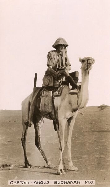 Captain Angus Buchanan on a camel in Mesopotamia