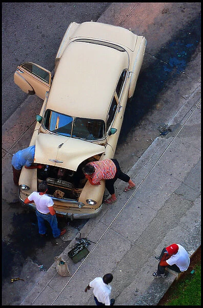 Car repairs in street, Havana Cuba