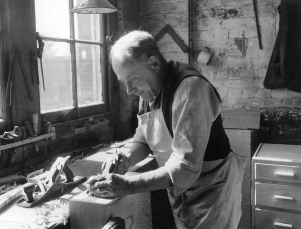 Craftsman at a cabinet makers, Shoreditch, London