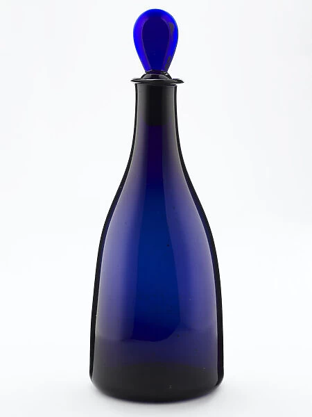 Decanter of tapered form made from blown and bevelled blue glass