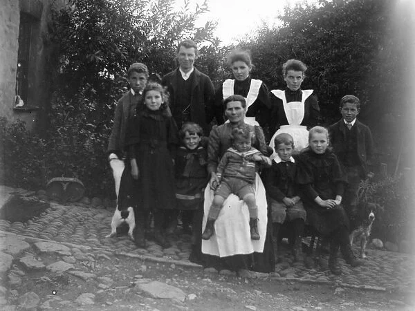 Family group in garden, South Wales