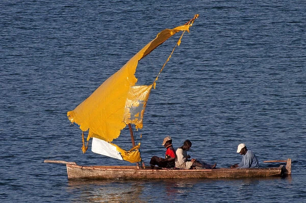 Fishermen - in boat with torn sail