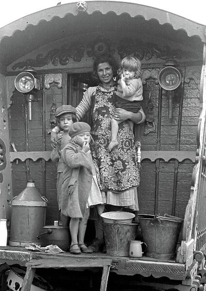 Gipsy woman with three children