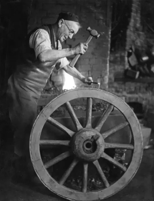 Framed Print : Wheelwright at Work Print, 1930s Framed Print : Wheelwright at Work Print, 1930s