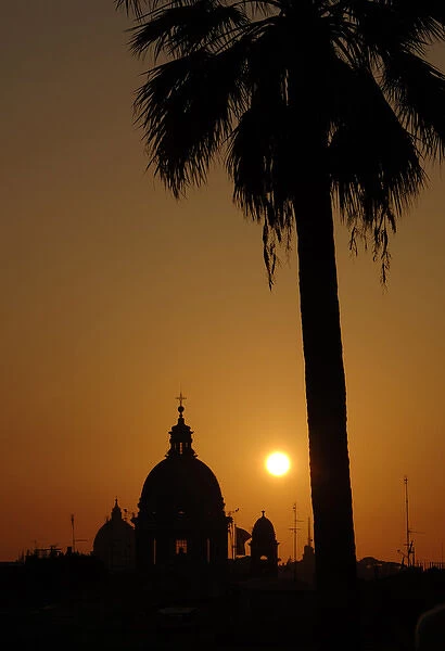 Italy. Rome. Basilica of San Carlo al Corso at sunset. Backl
