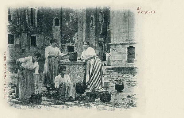 Local Women fetching drinking water from a well - Venice