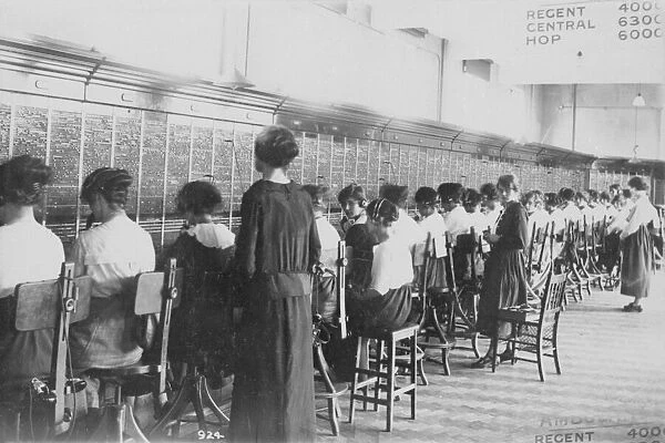 A long line of telephone switchboards