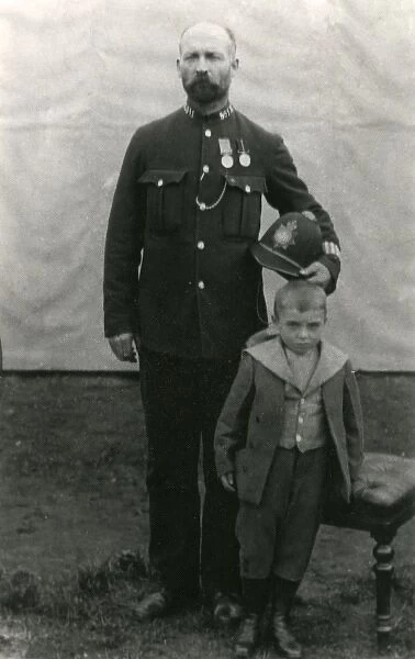 Metropolitan Police officer with young son