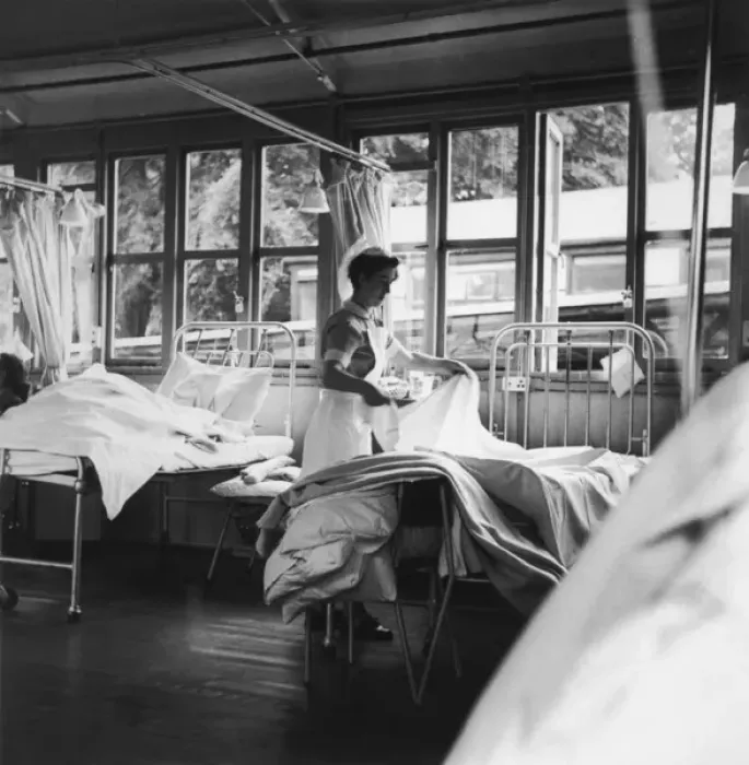 Framed Print : Nurse Making a Bed Print Framed Print : Nurse Making a Bed Print