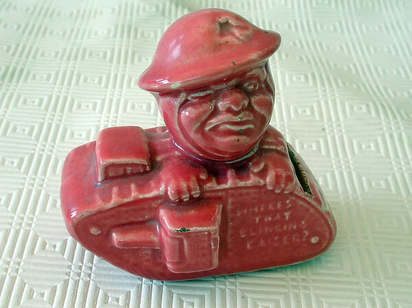 Old Bill Pink glazed money box in the form of a WW1 tank