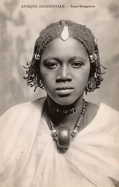 Pretty Young Senegalese girl with braided hair and necklace