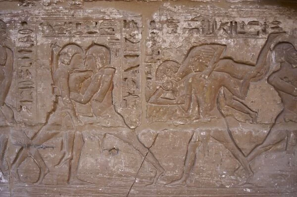 Temple of Ramses III. Relief depicting wrestling. Egypt