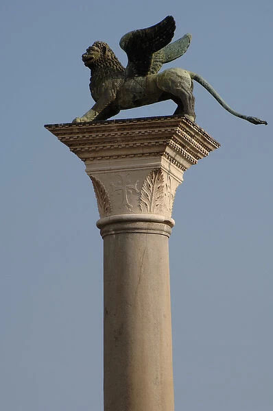 Winged lion statue of Saint Mark on a granite column in the