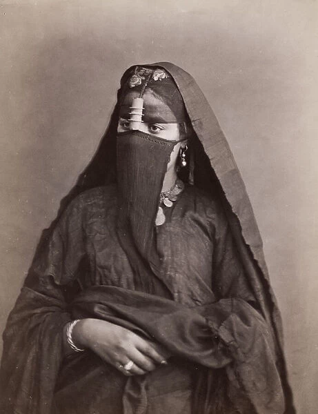 Young Arab woman with a face veil, Egypt
