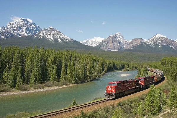 Morant's Curve - Canadian Pacific Railway with Bow range of mountains in the background - Banff National Park Alberta, Canada LA004247