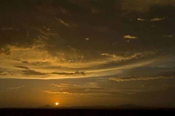 Sunset with cloud build near the Brandberg Massive. Namib Desert Namibia, Africa