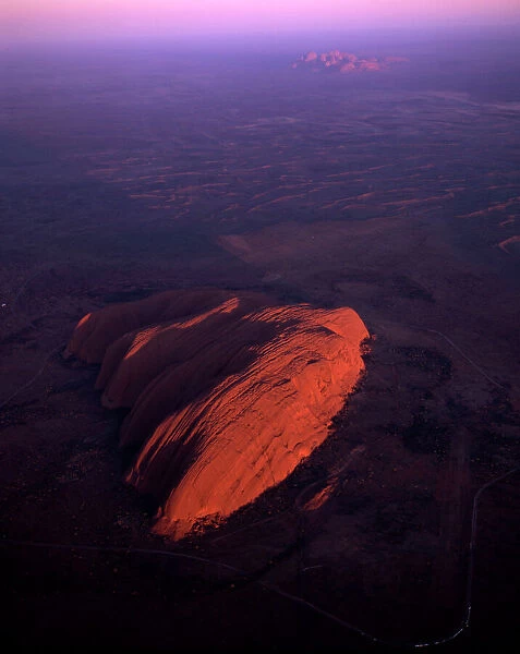 Uluru (Ayers Rock) at sunrise, aerial image, Uluru-Kata Tjuta National Park (World Heritage Area), Northern Territory, Australia JPF44469