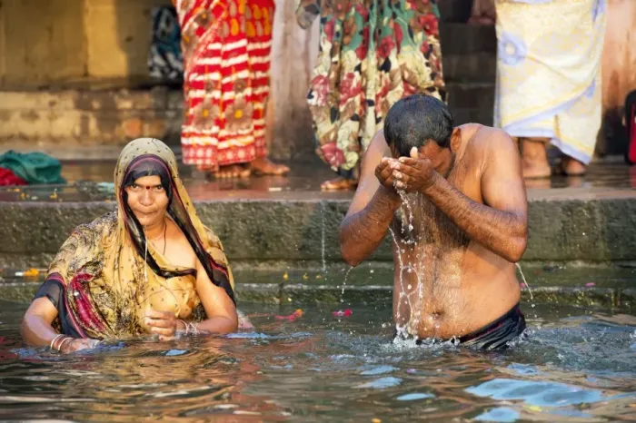 Framed Print : Print of Hindu pilgrims bathing in the River Ganges, Varanasi, India Framed Print : Print of Hindu pilgrims bathing in the River Ganges, Varanasi, India