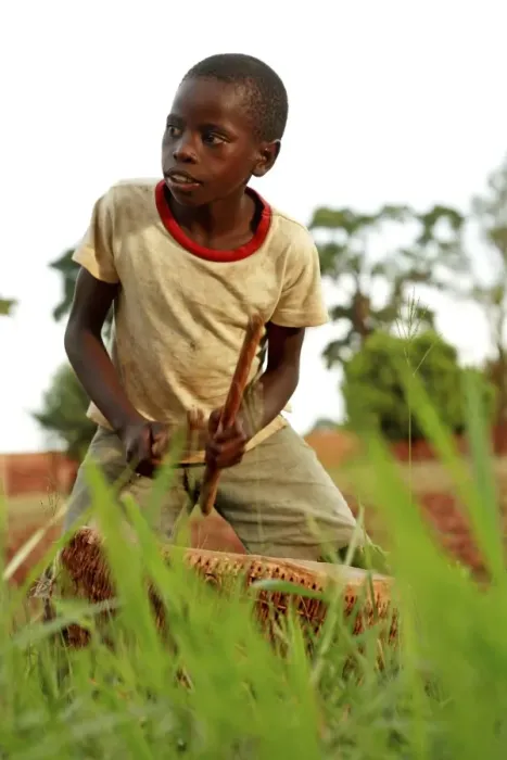 Framed Print : Uganda Boy Playing Drum Print Framed Print : Uganda Boy Playing Drum Print