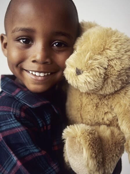 Boy with teddy bear