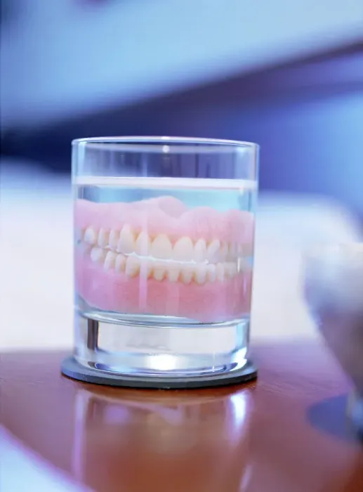 Framed Print : False teeth in a glass of water Print Framed Print : False teeth in a glass of water Print