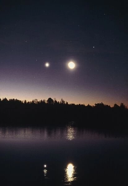 Moon & Venus at dawn over lake