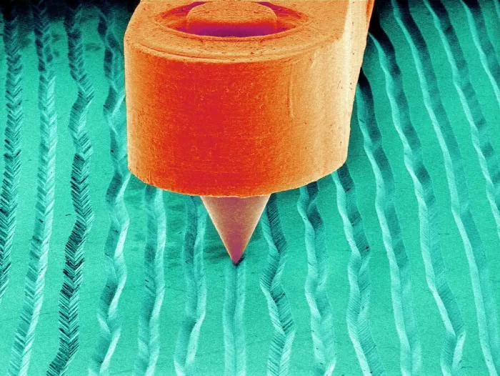 Framed Print : SEM Print of a Record Player Needle in Action Framed Print : SEM Print of a Record Player Needle in Action