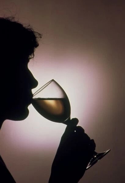 Person drinking alcohol, silhouette