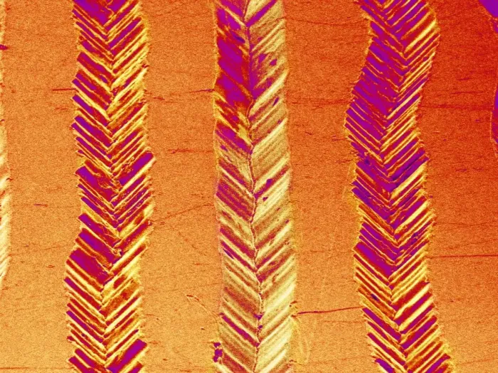 Framed Print : Record surface Print, Coloured SEM of grooved plastic Framed Print : Record surface Print, Coloured SEM of grooved plastic