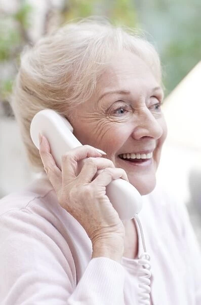 Senior woman talking on the telephone