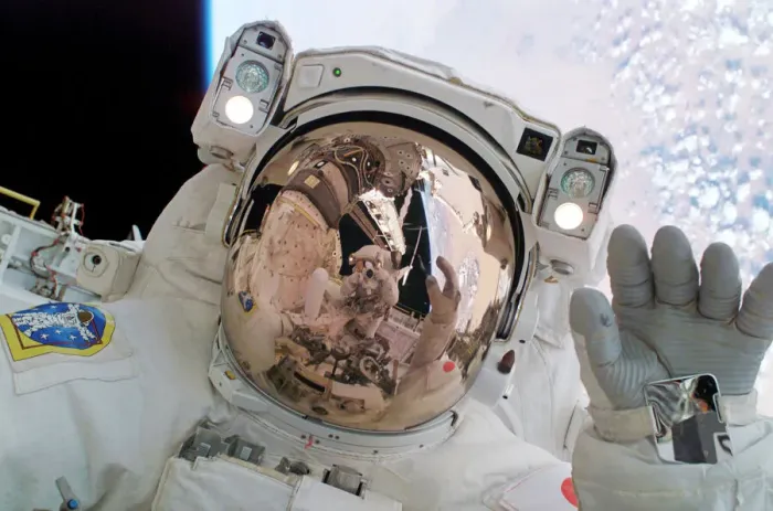 Framed Print : Return to Flight Spacewalk Print: Astronaut Soichi Noguchi waving Framed Print : Return to Flight Spacewalk Print: Astronaut Soichi Noguchi waving