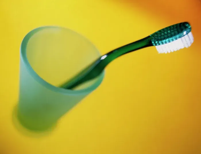 Framed Print : A Green Toothbrush in a Pot Print Framed Print : A Green Toothbrush in a Pot Print