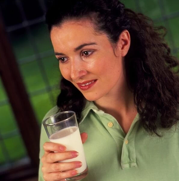 Woman with a glass of milk