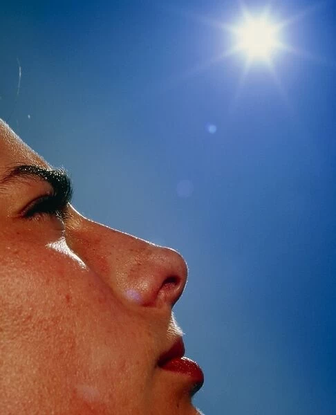 Womans face with sun