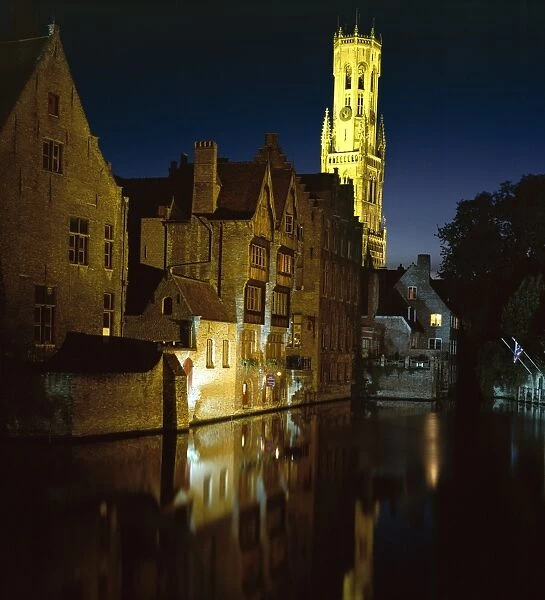The Belfry of Belfort-Hallen illuminated at night, Bruges (Brugge), UNESCO World Heritage Site