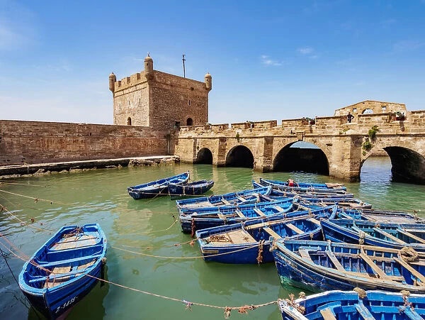 Blue boats in the Scala Harbour and the Citadel, Essaouira, Marrakesh-Safi Region