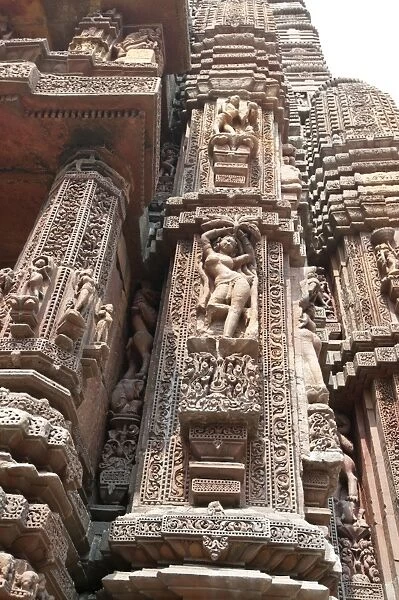 Carving of woman on the vimana of the 11th century Rajarani temple, known as the love temple, dedicated to Lord Shiva, Bhubaneshwar, India, Asia