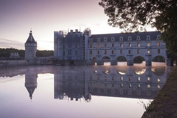 The chateau of Chenonceau reflecting in the waters of the River Cher at dawn, Indre-et-Loire